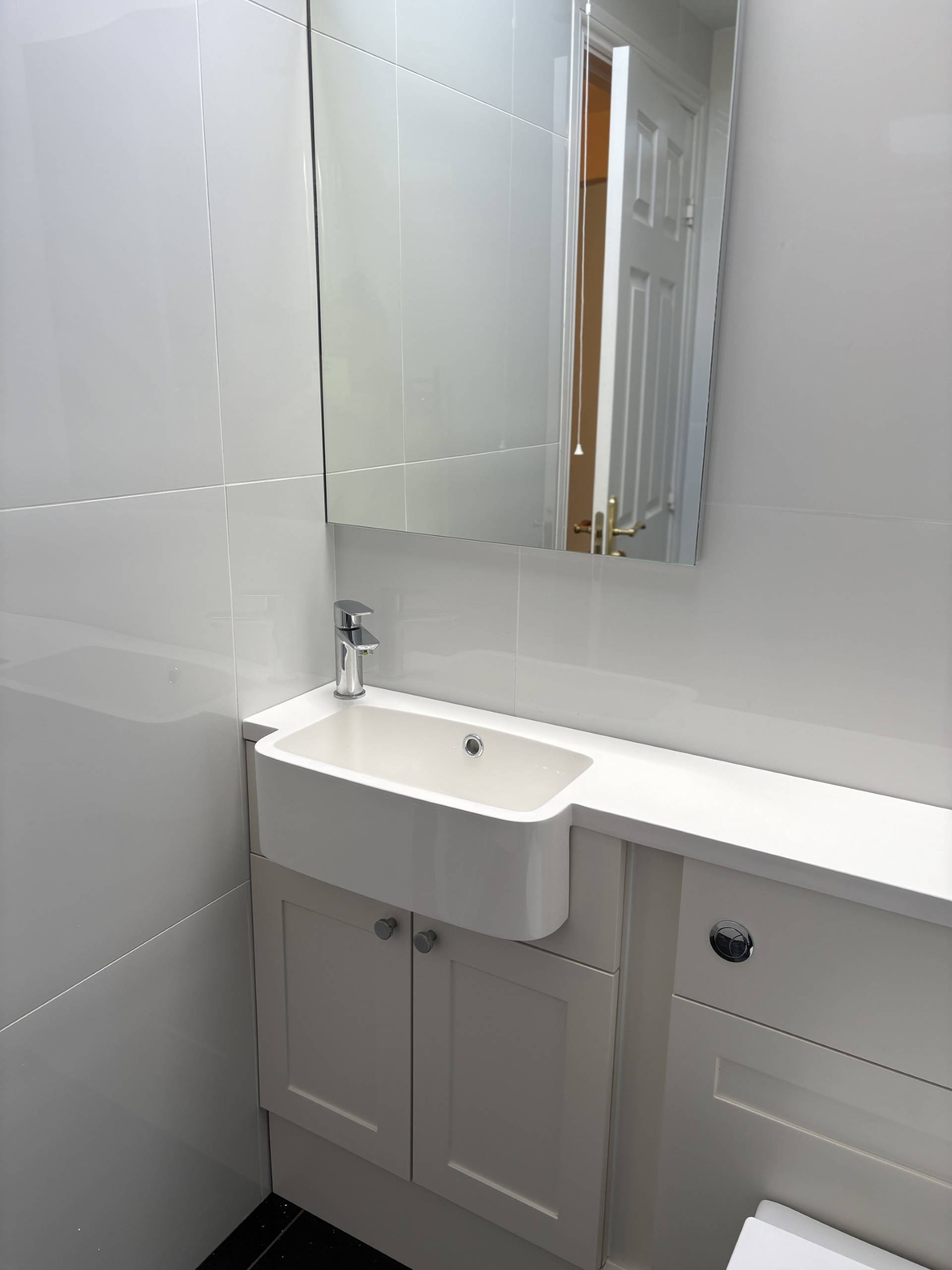 bathroom mirror and sink installation